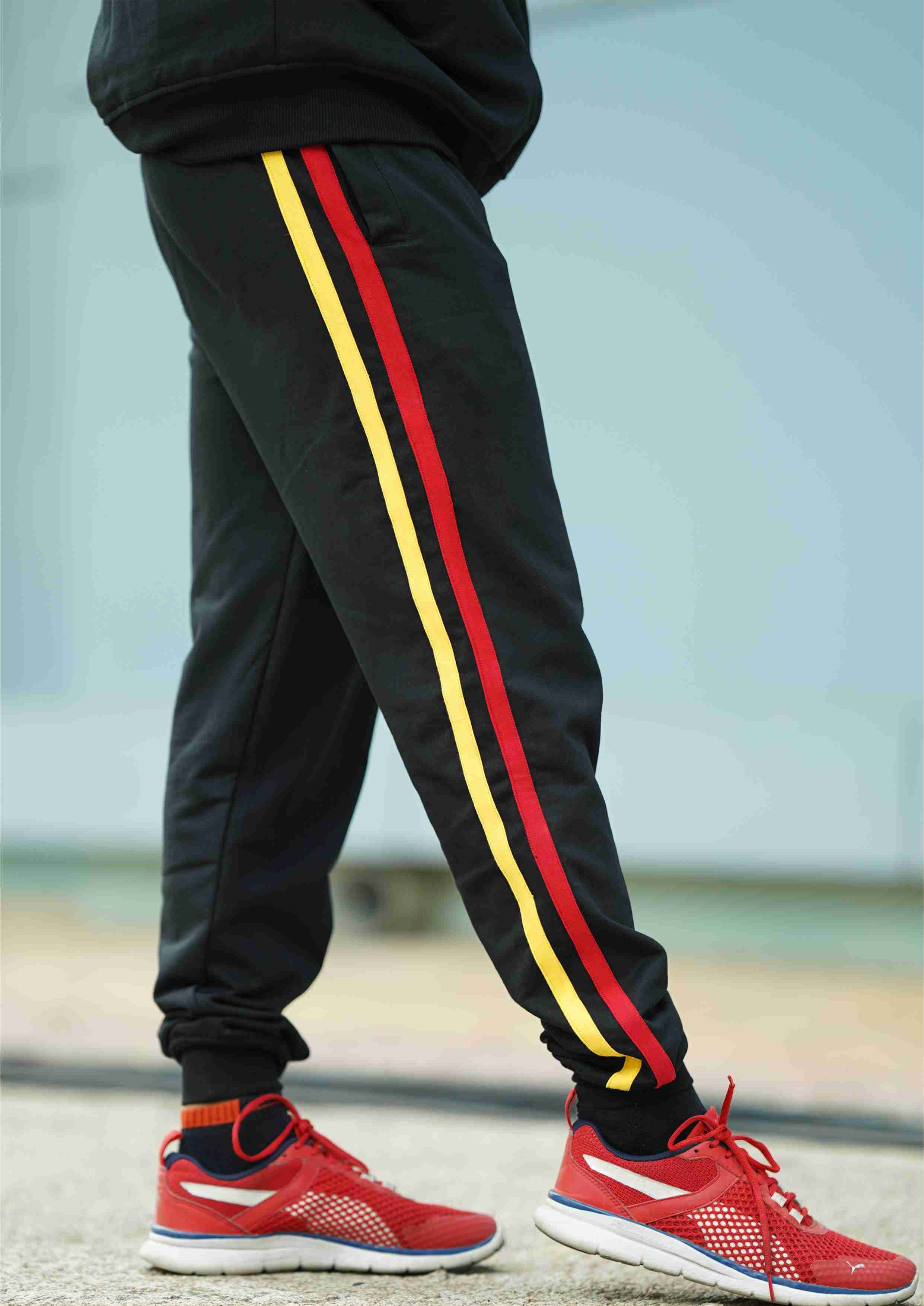 JOGGER (RED AND YELLOW SIDE STRIPS)BLACK